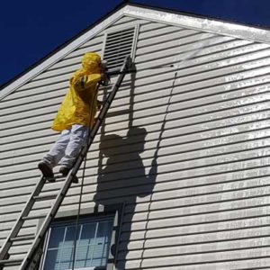 Powerwashing home exterior and siding